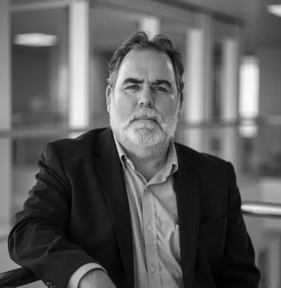 Jeff Brown- Honeytree Technologies founder in business attire in his office