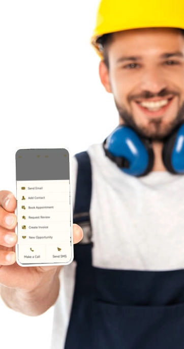Smiling worker showing mobile phone screen apps