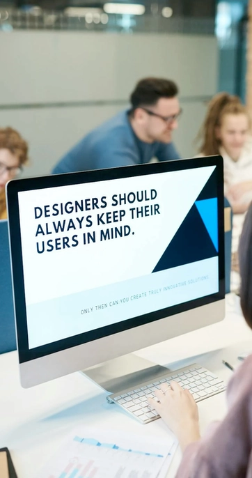 Designers discussing user-focused strategies at work.