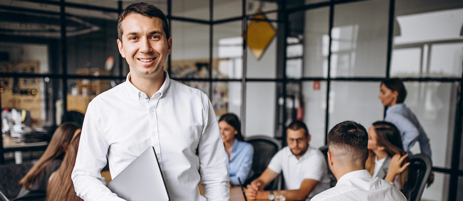 Smiling professional in modern office meeting room