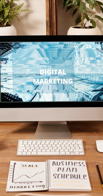 Desk setup with digital marketing screen display