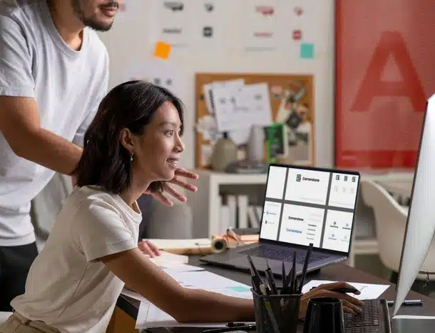 Office teamwork with colleagues collaborating on project